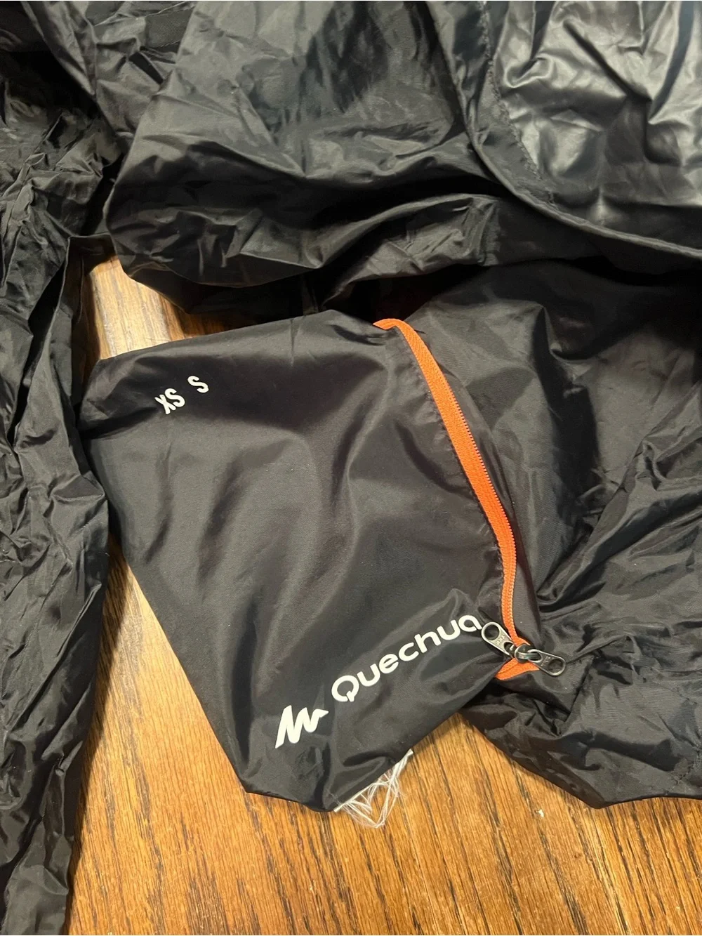 Quechua Packable Black Hooded Rain Anorak with Orange Drawcords